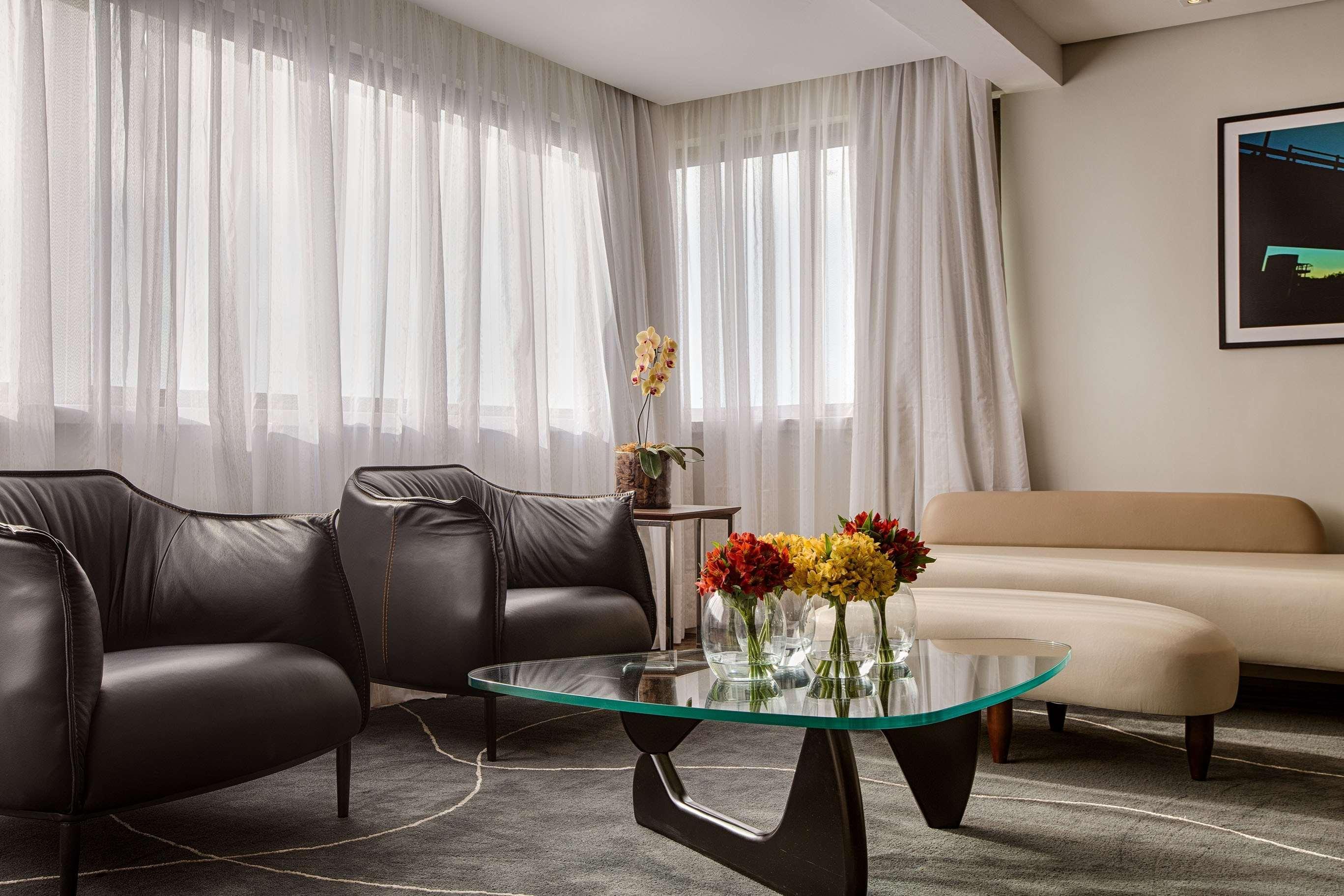 Art Hotel Transamerica Collection Порту Алегри Екстериор снимка A living room at the hotel